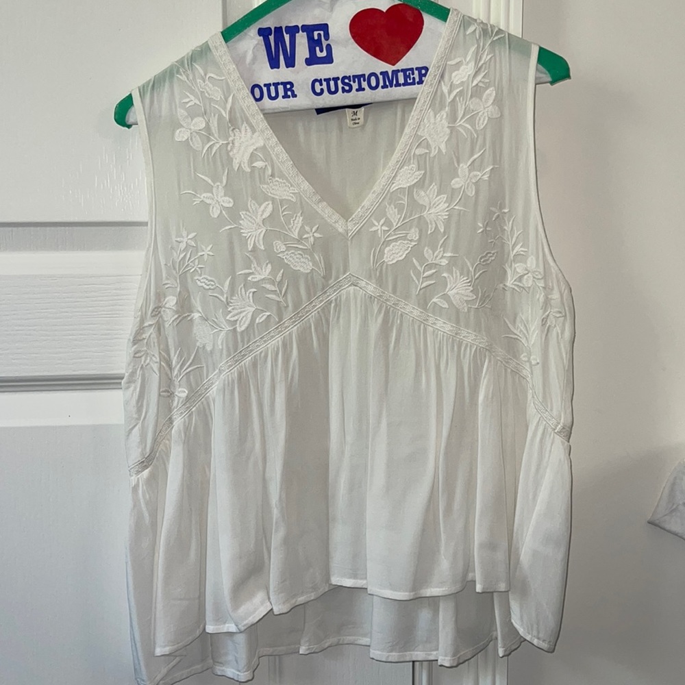 Size medium blue rain white top with floral white flower patching